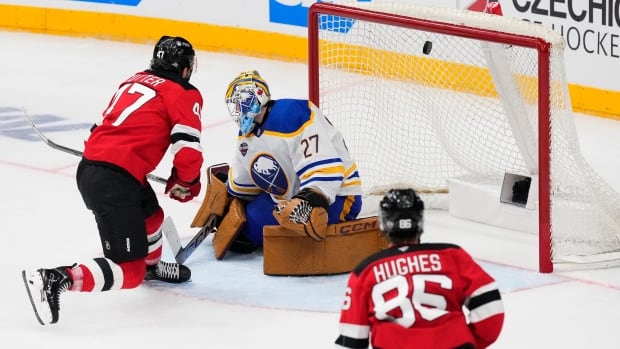 >-cotter-scores-as-devils-beat-sabres-3-1-to-sweep-season-opening-series-in-prague
