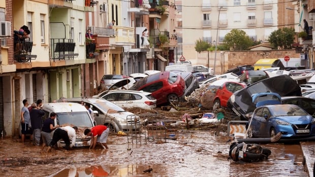 As a minimal 72 killed in Spain after devastating floods, mudslides