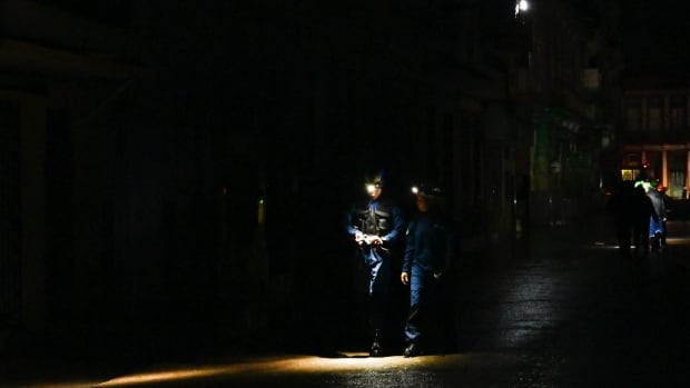Typhoon Rafael knocks out Cuba’s energy grid, slows to Class 2