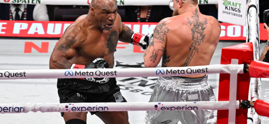 The Tyson-Paul “wrestle” in 10 photos