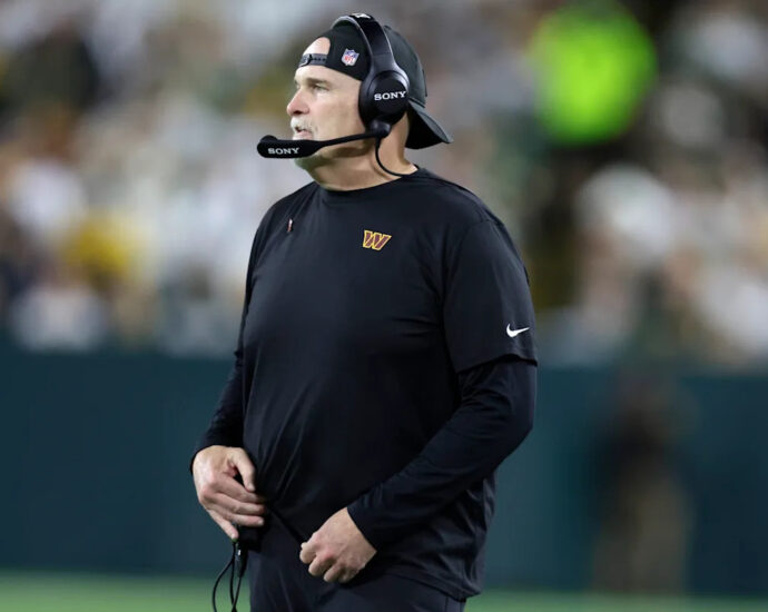 commanders-coach-dan-quinn-bloodied-in-sideline-collision-with-marcus-mariota